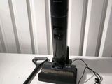 an image of a cordless vacuum cleaner on a table
