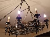 a chandelier that is hanging from the ceiling
