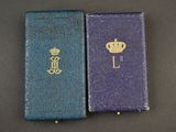 an image of two books with a crown on top of them
