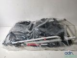 a plastic bag filled with various items on a table