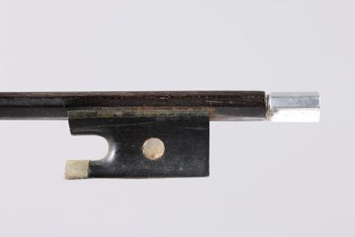a close up of a violin bow on a white background