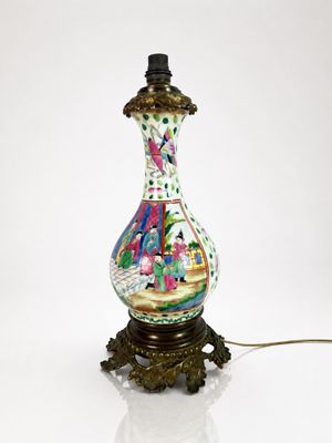 a lamp that is sitting on a table with a white background