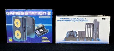two boxes of electronic gaming equipment on a black surface