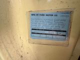 a label on the side of a machine that says mid by ford motor co