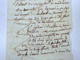 a close up of a piece of paper with writing on it