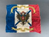 an old flag with a coat of arms and a crown on it