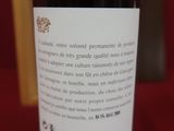 a bottle of wine that is sitting on a table