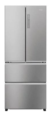 a silver refrigerator freezer sitting on top of a white surface
