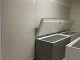 a photo of a commercial washer and dryer in a laundry room
