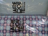 two boxes of toiletries that are wrapped in plastic