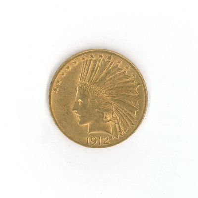 une pièce d'or sur laquelle est représentée une tête d'Indien