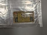 a piece of paper that has been wrapped in plastic