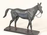a statue of a horse with a bridle on it ' s head