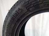 a close up of a tire on a white surface