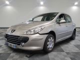 a picture of a silver car that is parked in a garage