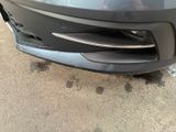 a close up of the front bumper of a car
