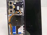 a picture of a cell phone with a broken screen