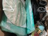 a cardboard box filled with baby items and diapers