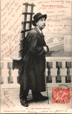 une vieille carte postale représentant un homme avec une canne et un chapeau