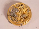 an image of a close up of a watch face with gears and wheels