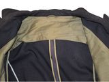 the back of a jacket with a zipper down the side