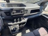 the interior of a car with a dashboard and steering controls