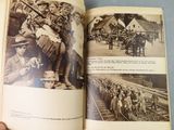 an open book with a picture of a group of people on it