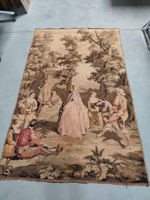 a rug that has a picture of a woman and children on it