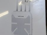a box with a wireless router on it sitting on a table