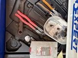 a blue box with tools inside of it