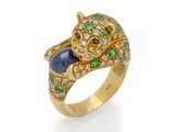 a diamond, sapphire and emerald panther ring