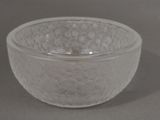 a glass bowl that has a flower design on it