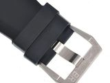 the strap is black and has a silver buckle on it