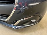 a close up of a car ' s front bumper