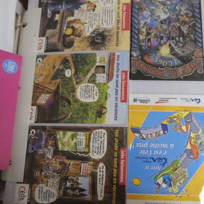 a lot of books that are sitting on a table