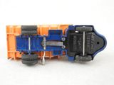 a blue and orange toy truck on a white surface