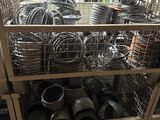 many different types of pipes and pipes in the warehouse