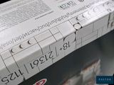 a box of pizza sitting on top of a table