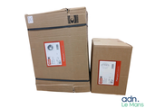 two boxes that are stacked on top of each other