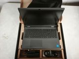 a laptop that is sitting in a box on a table