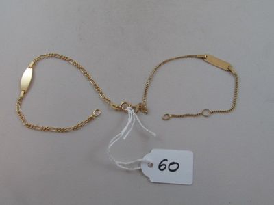 two gold bracelets with a tag that says 60 on them