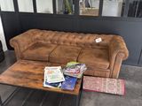 a couch and a coffee table in a living room