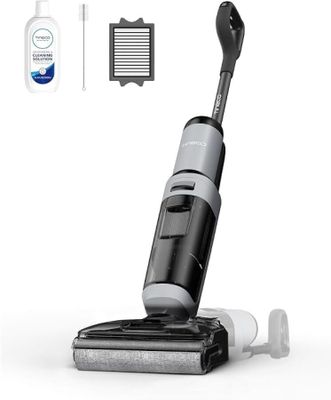 une image représentant un aspirateur en noir et blanc muni d'une brosse de nettoyage