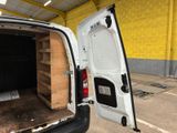 a white van that is open with the door open