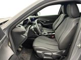 the interior of a car with the front seats folded down