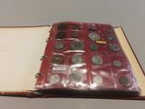 a book with a bunch of coins inside of it