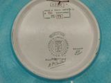 a blue plate with a picture of a man on it