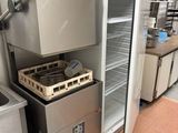 a commercial kitchen with stainless steel appliances and counter tops