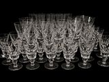 a lot of empty wine glasses on the table