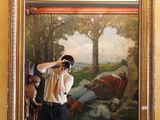 un homme se prenant en photo dans un miroir